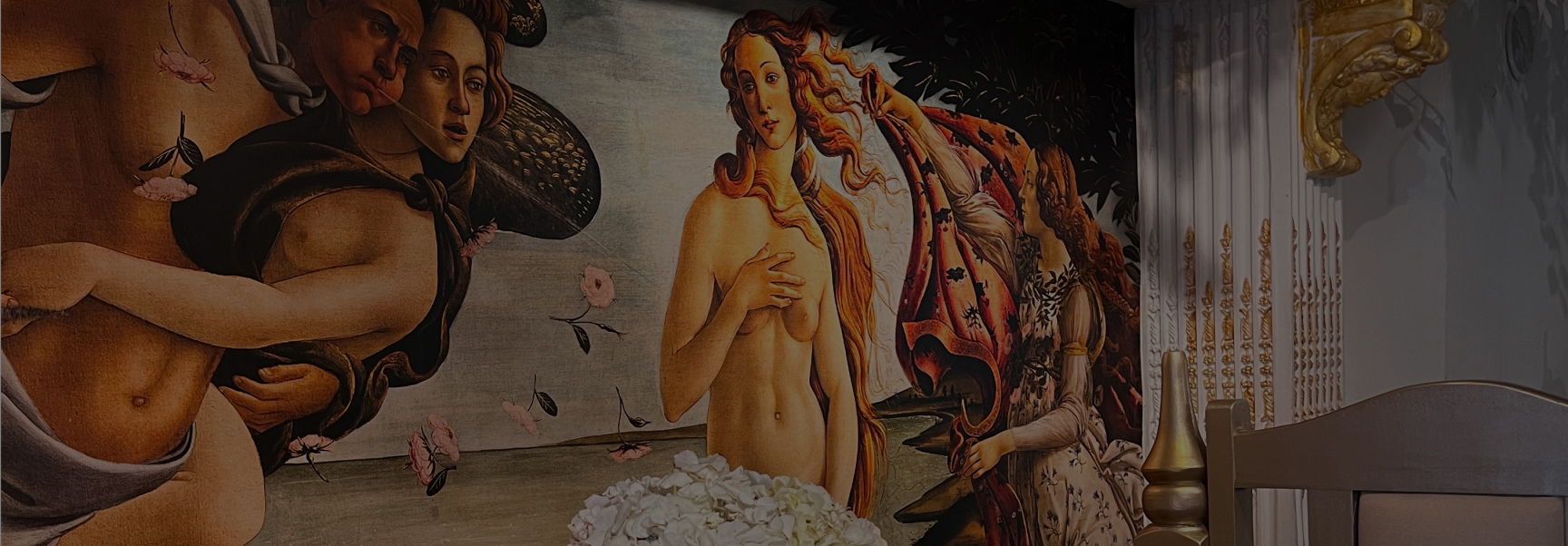 Chris standing up holding his daughter Elva